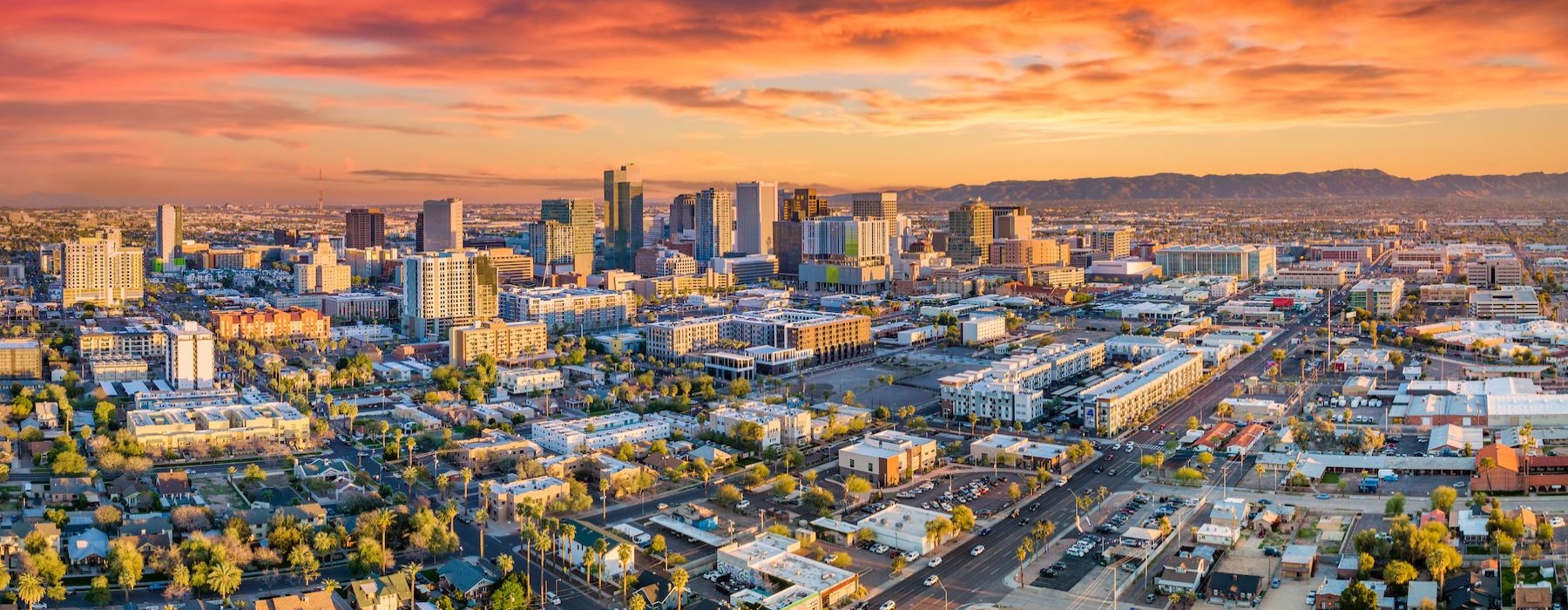 a city with a sunset