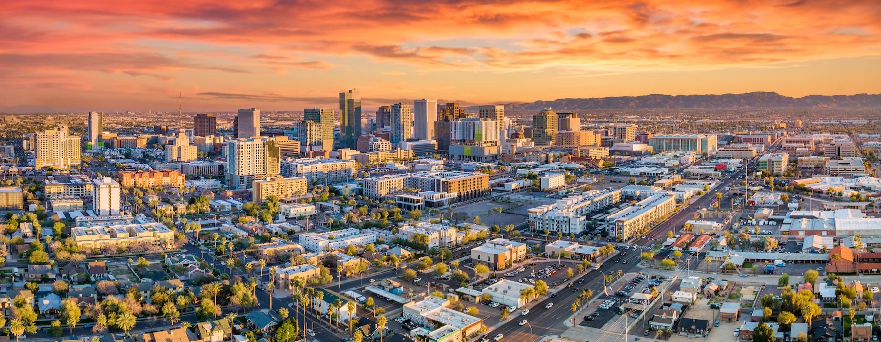 a city with a sunset